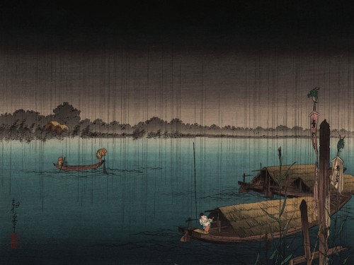 River in the rain docked on the sumida river
