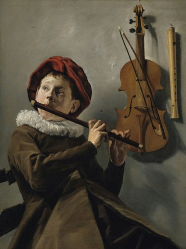 Boy playing the Flute