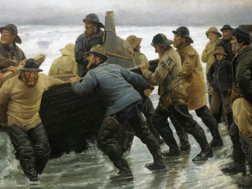 Fishermen launching a rowing boat