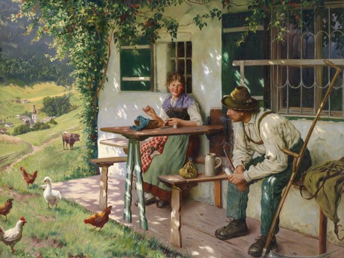 Junges Paar vor einem Bauernhaus