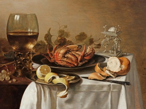 A still life with a roemer, a crab and a lemon
