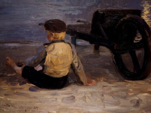 Fisher boy sitting beside
