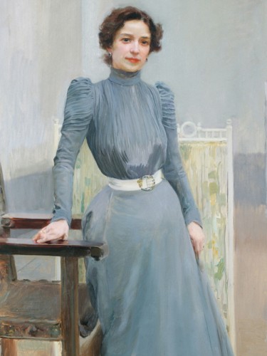 Clotilde in a grey dress
